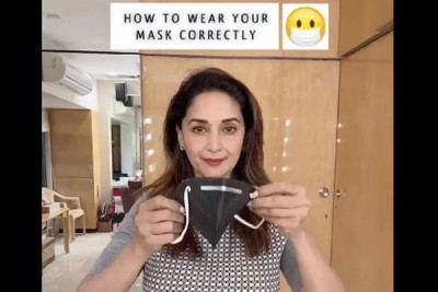 মাস্ক কীভাবে পড়তে হয়, শেখালেন মাধুরী দীক্ষিত মাস্ক কীভাবে পড়তে হয়, শেখালেন মাধুরী দীক্ষিত