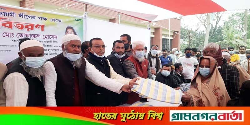 লৌহজংয়ে শীতার্তদের মাঝে কম্বল বিতরণ লৌহজংয়ে শীতার্তদের মাঝে কম্বল বিতরণ