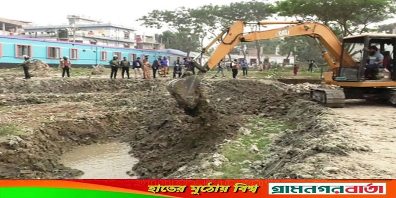 মাদারীপুরে কুমার নদে অবৈধভাবে দখলে নেয়া বাঁধ ভেঙে দিয়েছেন প্রশাসন মাদারীপুরে কুমার নদে অবৈধভাবে দখলে নেয়া বাঁধ ভেঙে দিয়েছেন প্রশাসন